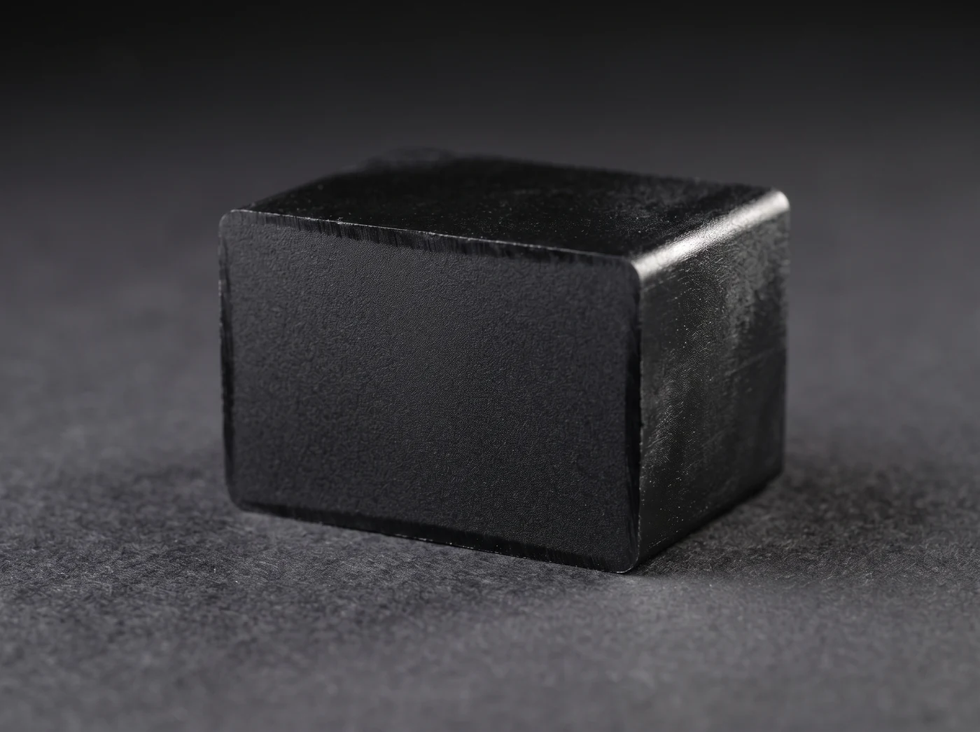 A block of black engineering nylon
